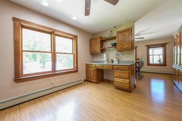 64 Pond View Dr, Otisfield, ME 04270 - kitchen featuring a baseboard radiator, a ceiling fan, brown cabinets, and recessed lighting