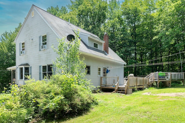 64 Pond View Dr, Otisfield, ME 04270 - view of side of home with a lawn, a chimney, and a deck