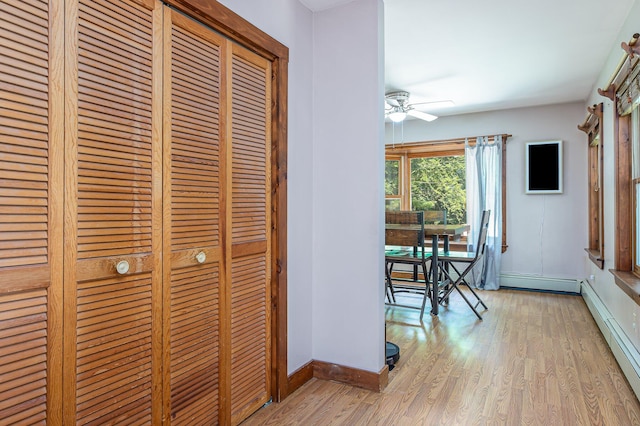 64 Pond View Dr, Otisfield, ME 04270 - corridor with a baseboard radiator and wood finished floors