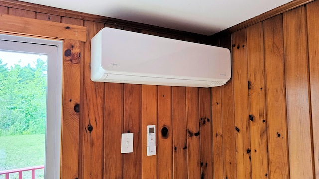 1106 S Belfast Ave, Augusta, ME 04330 - detailed view of an AC wall unit and wooden walls