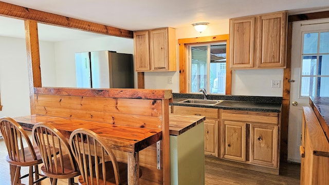 1106 S Belfast Ave, Augusta, ME 04330 - kitchen with dark wood-style floors, healthy amount of natural light, light brown cabinets, and wooden counters