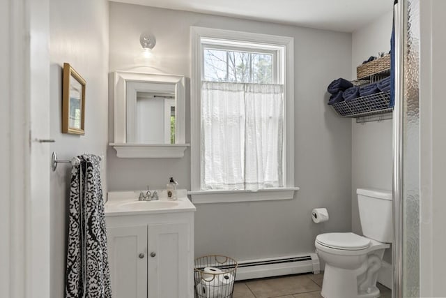 416 River Rd, Edgecomb, ME 04556 - bathroom featuring a baseboard radiator, tile patterned flooring, and vanity