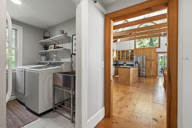 416 River Rd, Edgecomb, ME 04556 - washroom with light wood-style floors and washer and dryer