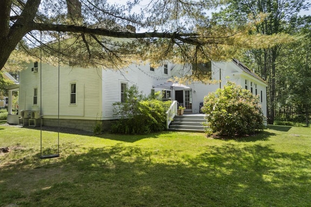 416 River Rd, Edgecomb, ME 04556 - rear view of property with a deck and a lawn