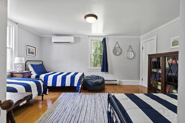 416 River Rd, Edgecomb, ME 04556 - bedroom with an AC wall unit, wood finished floors, a baseboard radiator, and ornamental molding
