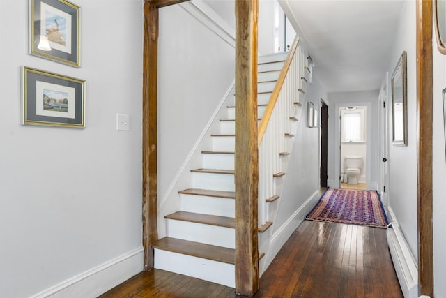 416 River Rd, Edgecomb, ME 04556 - stairway with a baseboard radiator and wood-type flooring