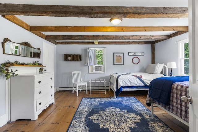 416 River Rd, Edgecomb, ME 04556 - bedroom featuring multiple windows, beam ceiling, hardwood / wood-style floors, cooling unit, and a baseboard radiator