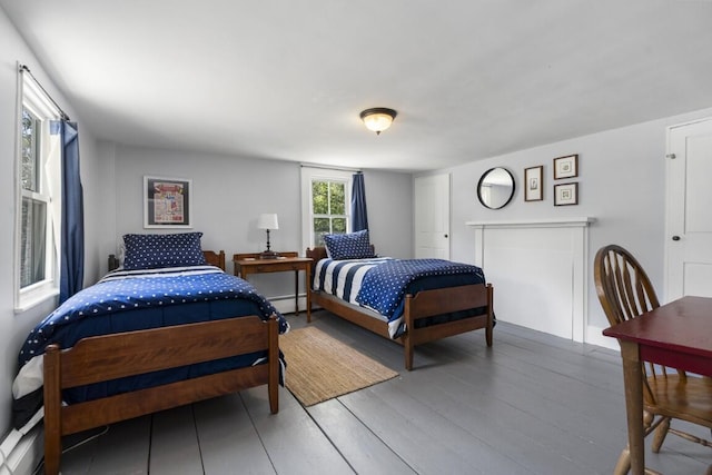 416 River Rd, Edgecomb, ME 04556 - bedroom with wood finished floors and baseboard heating