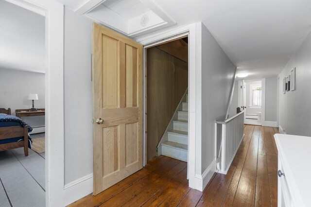 416 River Rd, Edgecomb, ME 04556 - staircase featuring hardwood / wood-style floors and a baseboard radiator