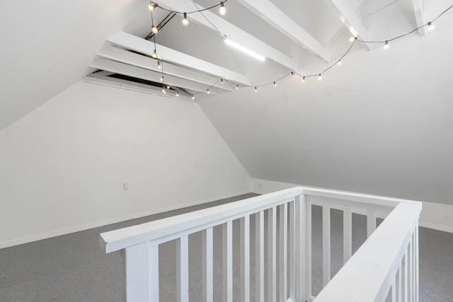416 River Rd, Edgecomb, ME 04556 - staircase featuring vaulted ceiling and carpet