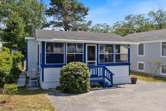 3 Island View Ave, Saco, ME 04072 - view of front of home with a sunroom and a shingled roof