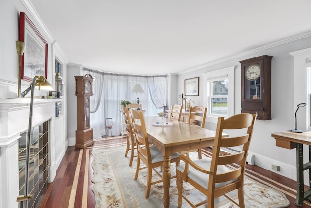 259 Mountain St, Camden, ME 04843 - dining space with ornamental molding and wood finished floors