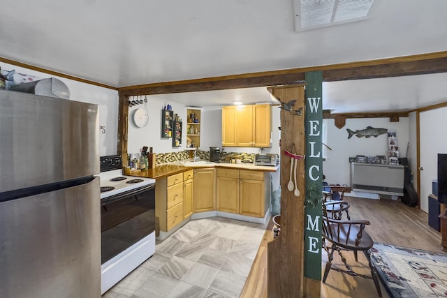 259 Mountain St, Camden, ME 04843 - kitchen featuring freestanding refrigerator, white electric range oven, and light brown cabinetry