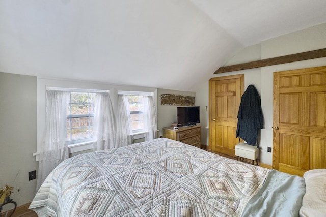 259 Mountain St, Camden, ME 04843 - bedroom with vaulted ceiling and wood finished floors
