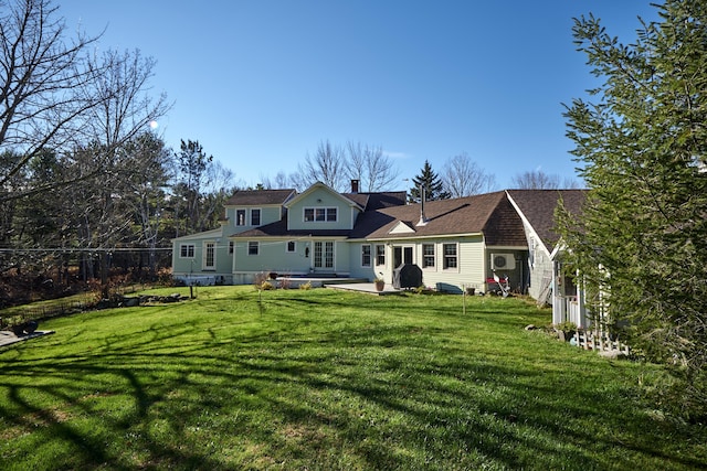 259 Mountain St, Camden, ME 04843 - rear view of property with a yard, a patio, and a chimney