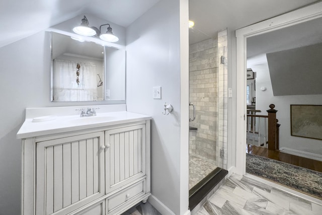 259 Mountain St, Camden, ME 04843 - bathroom featuring a shower stall, vanity, and marble look tile flooring