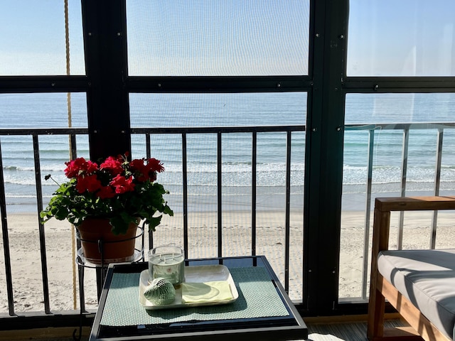 205 E Grand Ave Unit 7D, Old Orchard Beach, ME 04064 - balcony featuring view of water and beach and french doors