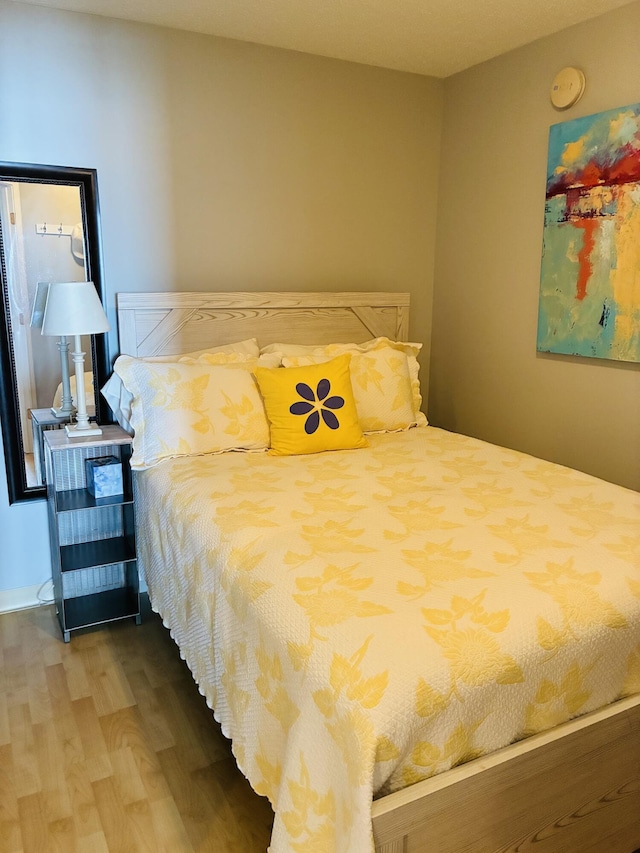 205 E Grand Ave Unit 7D, Old Orchard Beach, ME 04064 - bedroom featuring wood finished floors