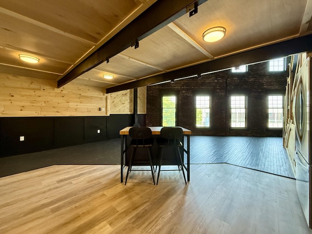 339 Main St, Calais, ME 04619 - dining room featuring wood finished floors, wooden walls, and wood ceiling