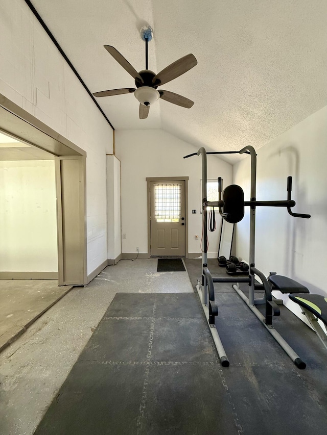 339 Main St, Calais, ME 04619 - workout room with vaulted ceiling, ceiling fan, and a textured ceiling