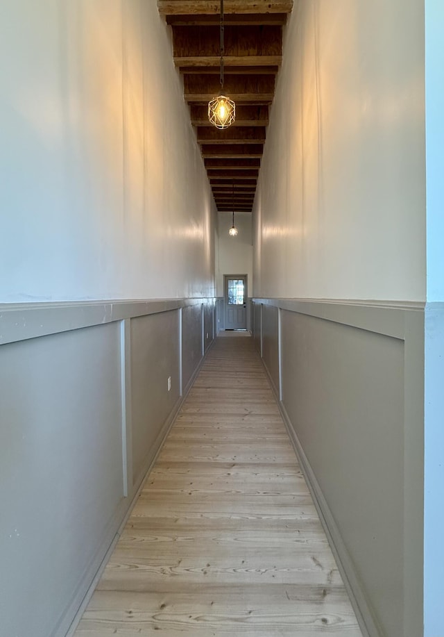 339 Main St, Calais, ME 04619 - corridor with light wood-style flooring and beam ceiling