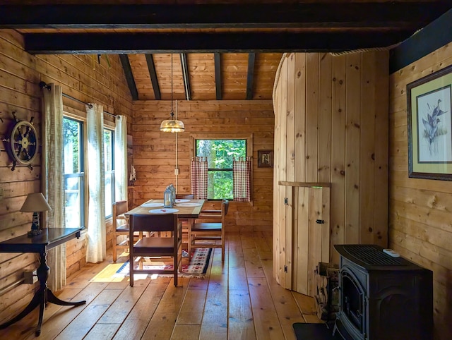 33 Mountain View Rd, Boothbay Harbor, ME 04538 - dining area featuring wood walls, light wood finished floors, healthy amount of natural light, wooden ceiling, and a wood stove
