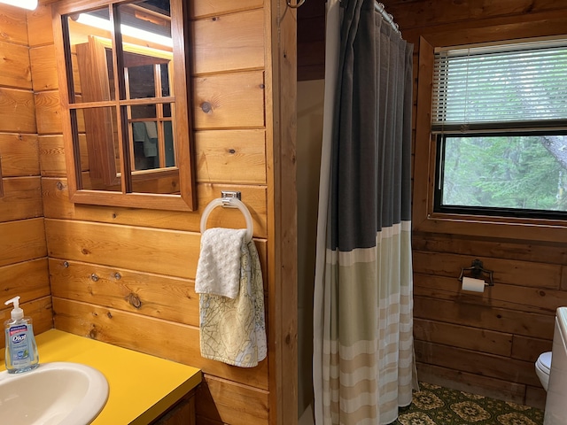 33 Mountain View Rd, Boothbay Harbor, ME 04538 - full bathroom with wooden walls, vanity, and curtained shower