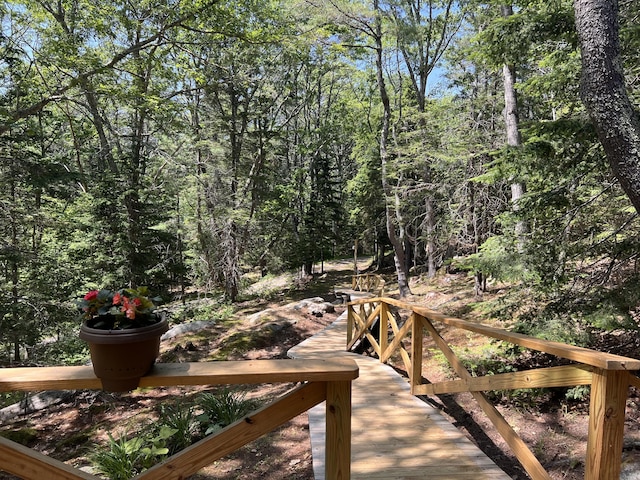 33 Mountain View Rd, Boothbay Harbor, ME 04538 - wooden terrace featuring a forest view