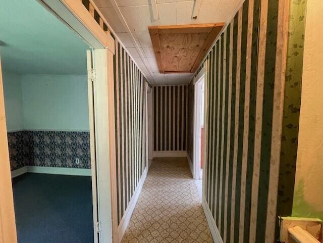 1069 Rte 193, Deblois, ME 04622 - corridor with wallpapered walls and attic access