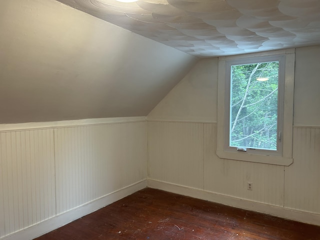 40 Silvermount St, Waterville, ME 04901 - additional living space featuring dark wood-style floors, lofted ceiling, and a wainscoted wall