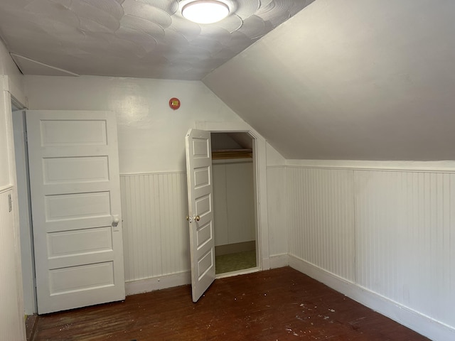 40 Silvermount St, Waterville, ME 04901 - additional living space featuring vaulted ceiling, wood finished floors, and a wainscoted wall