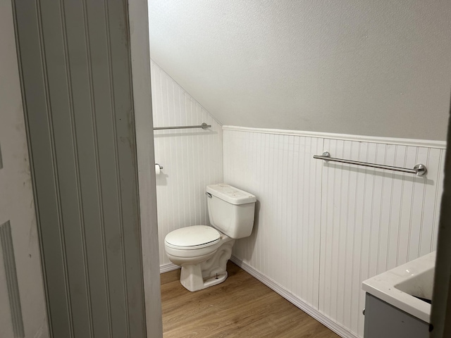 40 Silvermount St, Waterville, ME 04901 - half bath with wood finished floors, vanity, and lofted ceiling