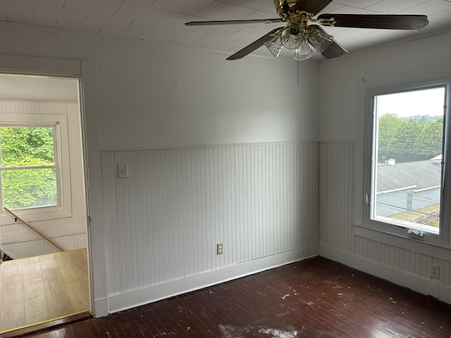 40 Silvermount St, Waterville, ME 04901 - spare room with hardwood / wood-style floors, a ceiling fan, wainscoting, and plenty of natural light