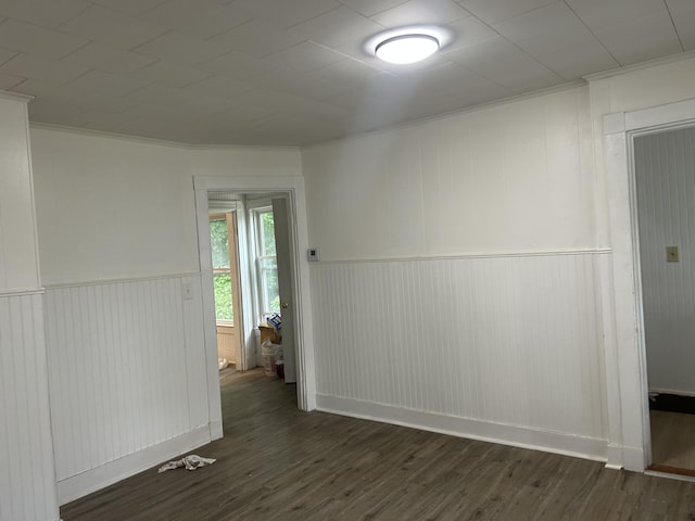 40 Silvermount St, Waterville, ME 04901 - spare room with dark wood-style flooring, crown molding, and a wainscoted wall