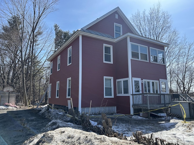 40 Silvermount St, Waterville, ME 04901 - snow covered property with a deck
