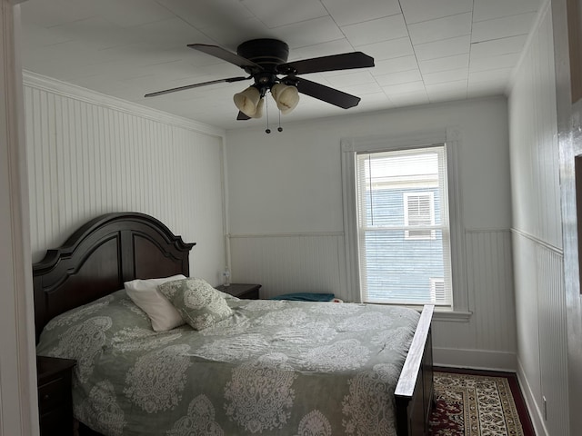 40 Silvermount St, Waterville, ME 04901 - bedroom featuring wood finished floors, a ceiling fan, wainscoting, and crown molding
