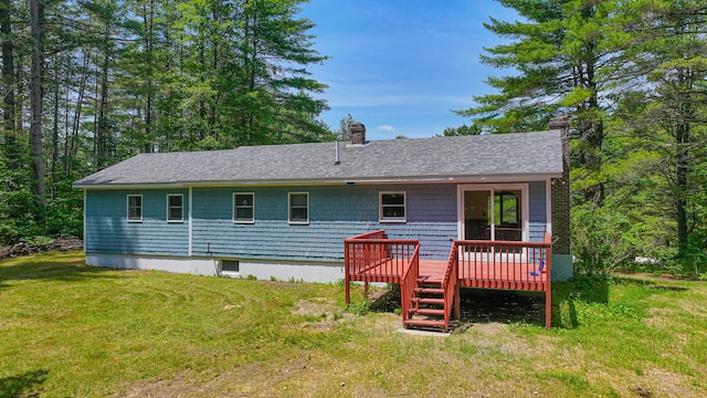 68 Hannibal Cir, Denmark, ME 04022 - rear view of property featuring a chimney, a wooden deck, a yard, and a shingled roof