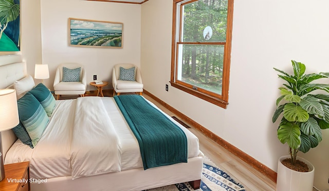 68 Hannibal Cir, Denmark, ME 04022 - bedroom with baseboards and wood finished floors
