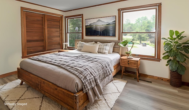 68 Hannibal Cir, Denmark, ME 04022 - bedroom with wood finished floors and ornamental molding