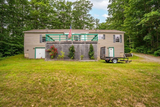 1080 Old Augusta Rd, Waldoboro, ME 04572 - back of house with a yard and a wooden deck