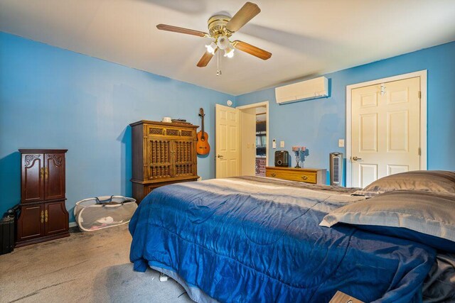 1080 Old Augusta Rd, Waldoboro, ME 04572 - bedroom featuring an AC wall unit, carpet, and ceiling fan
