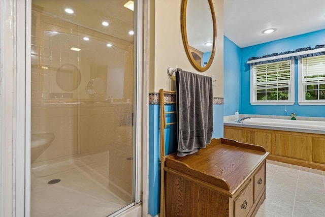 1080 Old Augusta Rd, Waldoboro, ME 04572 - bathroom featuring a shower stall, a bath, and recessed lighting