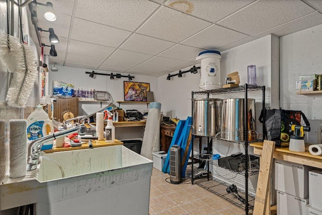 1080 Old Augusta Rd, Waldoboro, ME 04572 - miscellaneous room with a paneled ceiling and tile patterned flooring