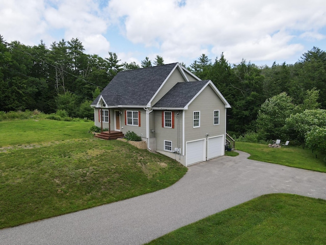 3 Erins Way S, Berwick, ME 03908 - view of front of home with driveway, an attached garage, roof with shingles, and a front lawn