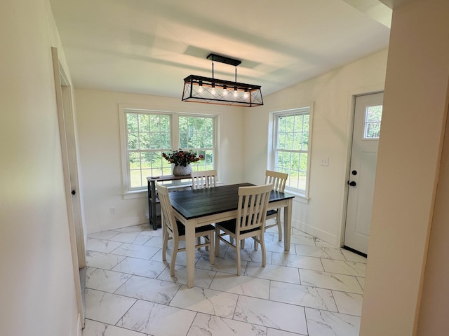 53 Rte 106, Leeds, ME 04263 - dining space with light marble finish floors