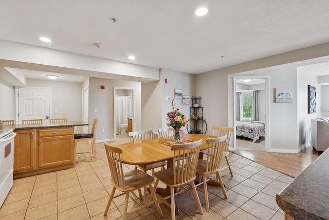 170 E Grand Ave Unit 8, Old Orchard Beach, ME 04064 - dining area with light tile patterned floors and recessed lighting
