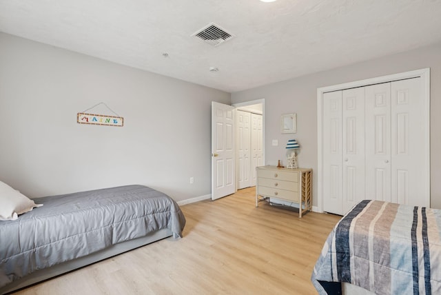 170 E Grand Ave Unit 8, Old Orchard Beach, ME 04064 - bedroom with light wood-type flooring and multiple closets