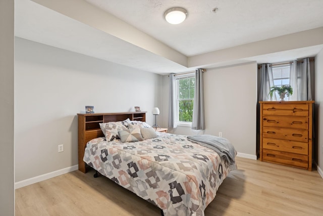 170 E Grand Ave Unit 8, Old Orchard Beach, ME 04064 - bedroom featuring light wood finished floors and baseboards
