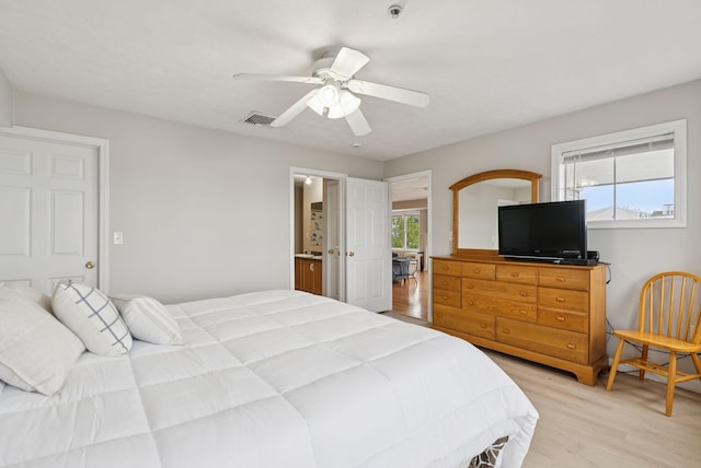 170 E Grand Ave Unit 8, Old Orchard Beach, ME 04064 - bedroom with light wood finished floors and a ceiling fan