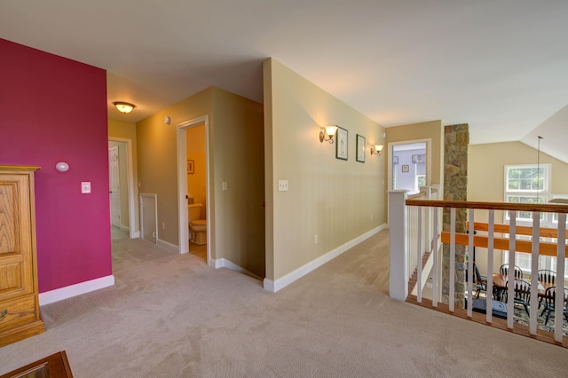 11 Washington Ct, Naples, ME 04055 - corridor featuring light carpet and an upstairs landing